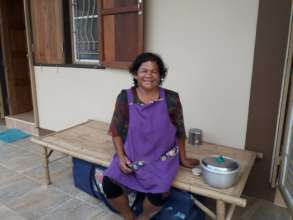 Khun Yai enjoying rice out of her new cooker