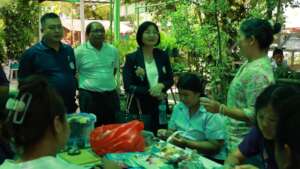 Students showing off their flower making skills.