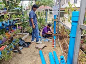 Building water feeders for the chicken coop.
