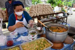 Serving food in reusable containers.