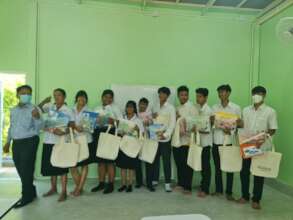 Some adult education students with stationary