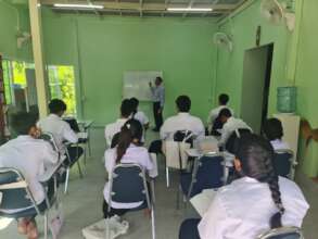 Adult students learning in Thai