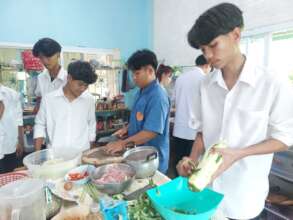 Students learn life skills such as cooking.