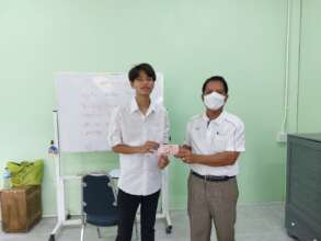 Recieving prizes for effort and excellence.