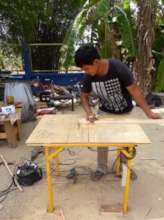 Using a home made table saw.