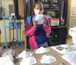 Making plain masks for students to decorate.