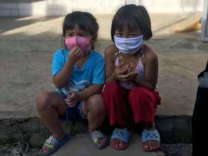 Receiving their mask providing safety and freedom