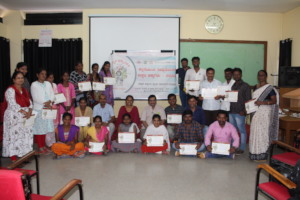 The team beaming with the training certificate.