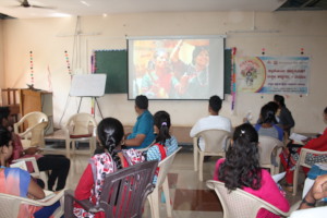 Group watching a film to appreciate child rights