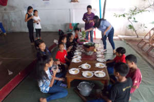 Students enjoying lunch at Champey
