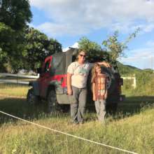 A family picks up trees to plant at their farm