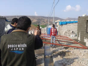 Staff members coordinate construction