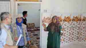 Staff with family during home renovations