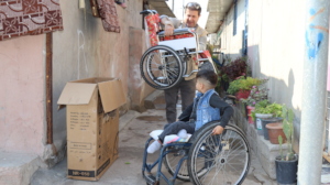 Boy who received a new wheelchair