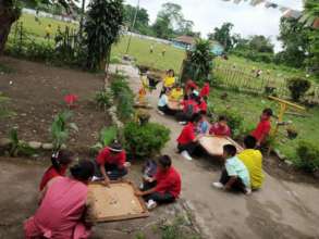 Primary school children enjoying board games.