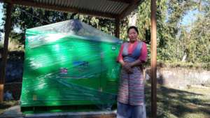 The school headmistress with the new generator.