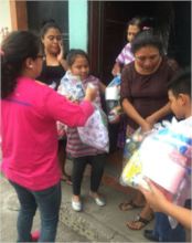 ASOGEN staff & volunteers deliver relief items.