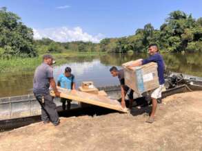 Unloading canoe of materials for the solar install