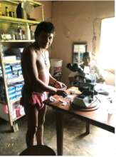 Ricardo, microscopist in the Cano Iguana clinic