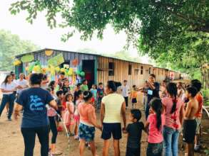 Children gather in front of the CFS.