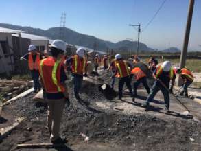 Volunteers working on the first phase of homes