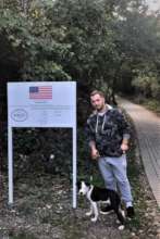 Fatmir walking his dog, Ace