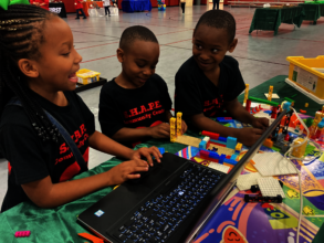 SHAPE children during FIRST Robotics competition
