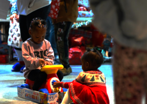 children playing with their new toys
