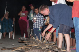 Markus the volunteer helping to set up the fire