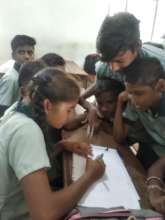 Girls and boys discussing creating stories