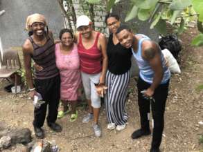 Local volunteers with our happy home-owner!