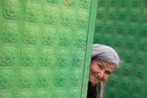 Fatime at the gate of her daughter's house