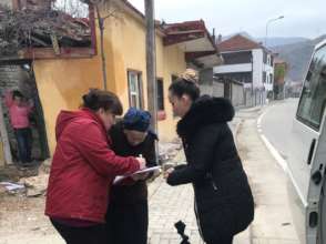 Delivering an aid package in Pogradec