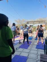 The volunteers also joined in the yoga.