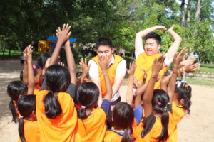 Volunteers working with the children