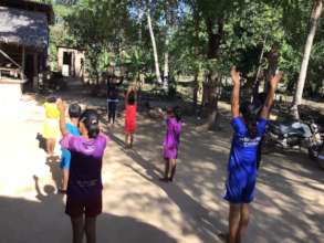 Stretching to prepare for the day's lesson!