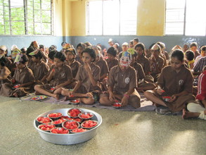 Girls made facemask and then enjoyed juicy fruit