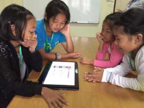 Girls on Computer at GRACE FRC