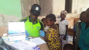 Volunteer conducting Malaria test