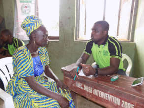 Doctor consulting a villager