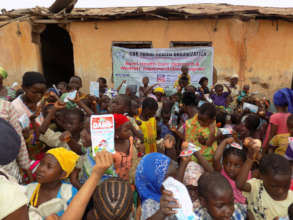 Section of children giving eggs and diary