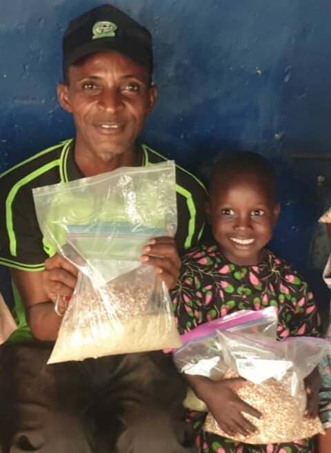 Treat malaria, give food to a child in Nigeria.