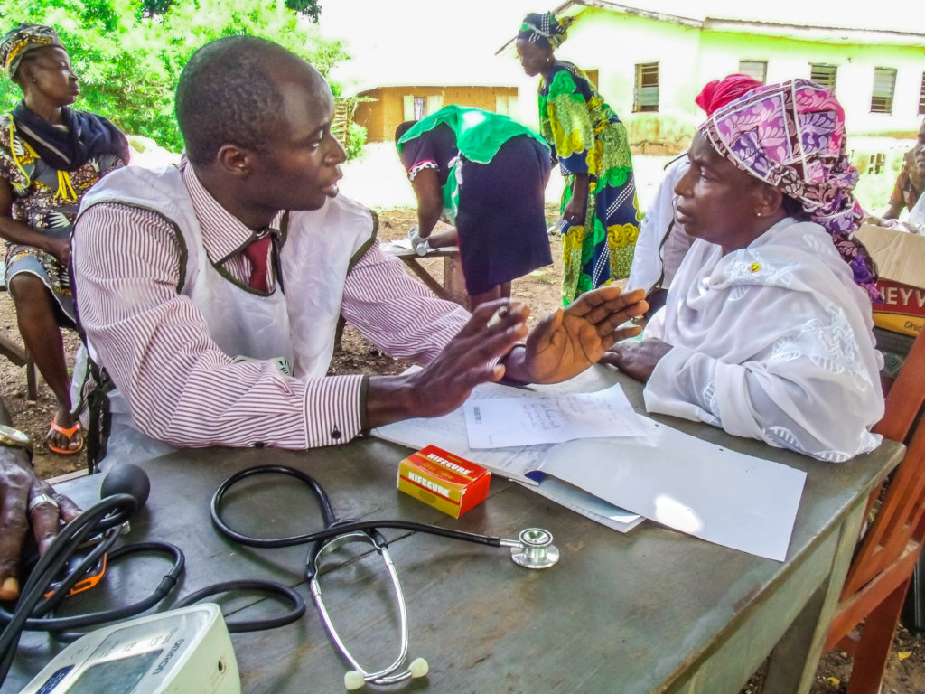 Treat malaria, give food to a child in Nigeria.