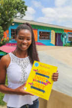 Janet with the book, Odd Dog Out