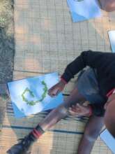 Pasting leaves in the shape of the letter e