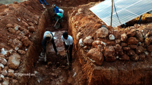 Constructing a moat to prevent elephant damage