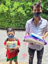 A single dad collecting a care package