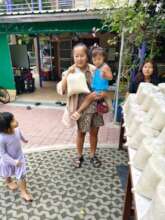 Coming to the centre to receive rice