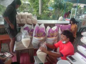 Preparing the 5kg rice bags
