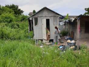 Families live in rooms with no toilets or water
